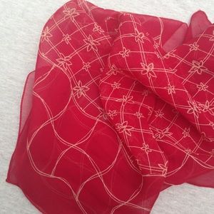 dark red scarf with cream pattern
